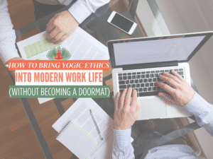 Top view of two people working on laptops and documents at a desk, with overlaid title text ‘How to Bring Yogic Ethics Into Modern Work Life (Without Becoming a Doormat)’ representing the blend of workplace culture and yogic principles.